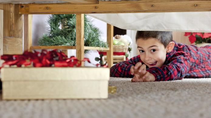 child searching for christmas presents