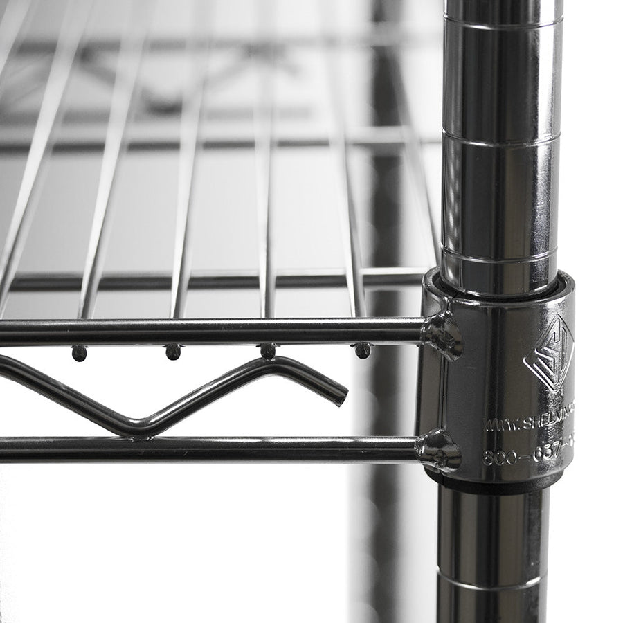 Full view of five-shelf chrome wire rack with items stored on middle shelves.