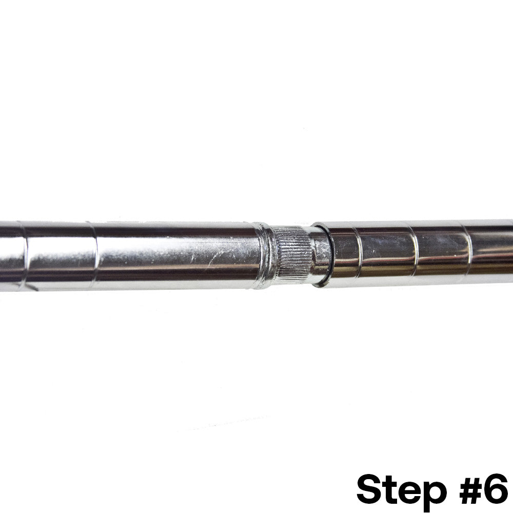 Final step for installing a 1-inch diameter wire shelving post extension kit, displaying two chrome shelving posts connected with the kit.